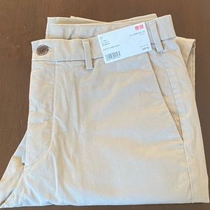 Size 32/34 beige Uniqlo Chinos. New with tags.